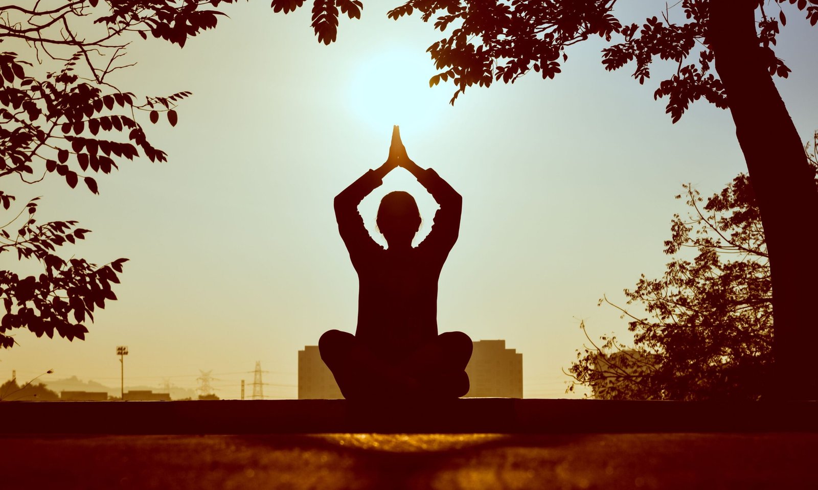 Person following a healthy morning routine for better health at sunrise